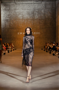 Lace dress with elaborate appliqués