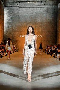 Lace dress with slit and appliqués