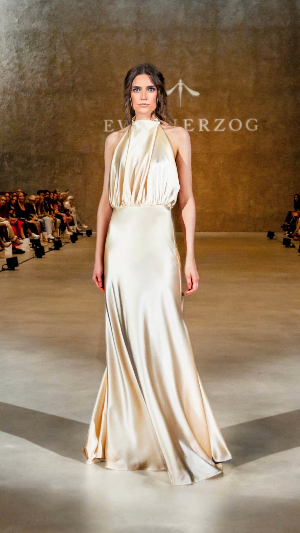 Long halterneck satin dress with draped neckline